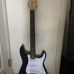 Electric guitar, included with speaker