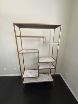 Gold shelving bookcase etagere