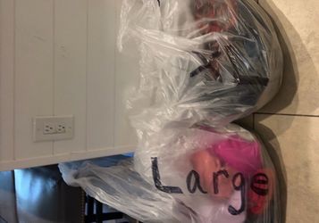 Bags of women’s clothes for resale