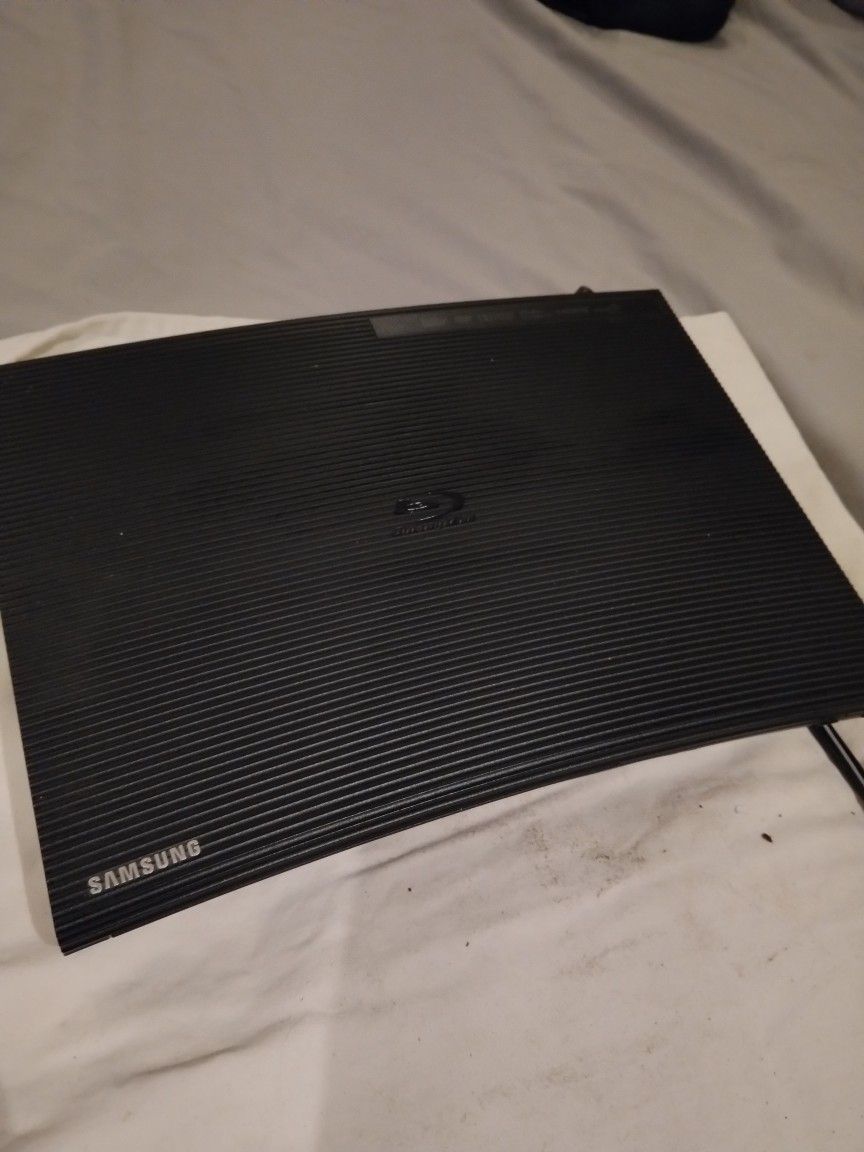 Samsung BD-J5100 Blu-ray player known for playing Blu-rays, DVDs, and CDs