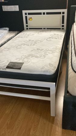 Twin size metal bed frame with deluxe mattress