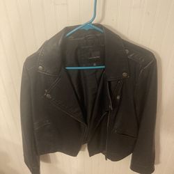 Woman’s leather medium coat by the limited