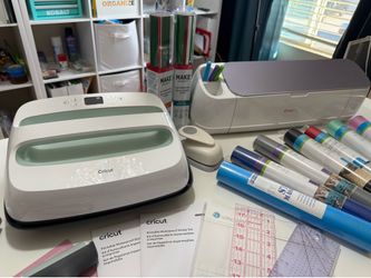 Cricut Maker and Heat Press and lots of accessories.