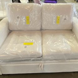 Brand New Storage Sofa – $230  Modern and practical 2-seater sofa with hidden storage space underneath the seat. Perfect for apartments, living rooms,