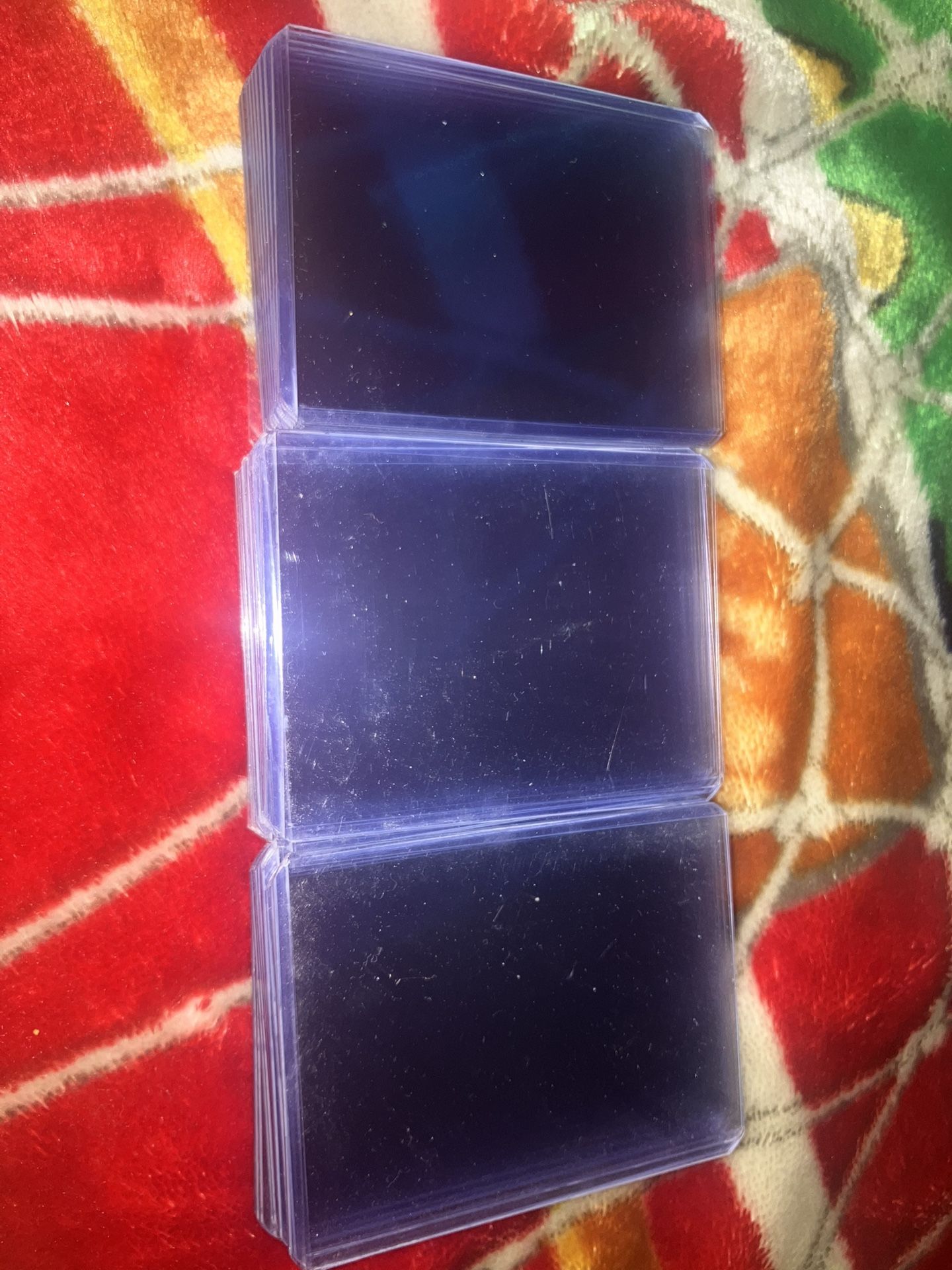 Selling 33 Transparent Cards Protectors For 12$