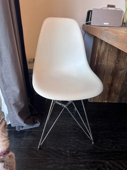 Eames Shell Chairs on Eiffel Tower Base 