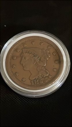 Large penny slanted 1955 with the knob on the ear