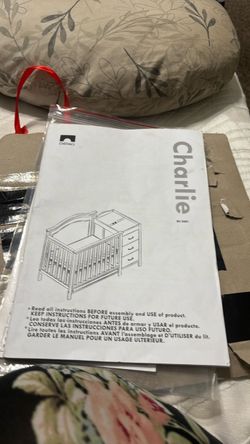 brand new 4 in one crib/slight crack on headboard