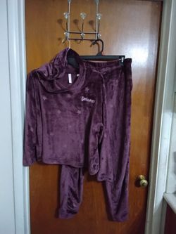 Purple Fleece top and bottom  with Star Pattern.  Like New.  Medium size 8-10