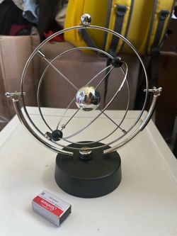 magnetic perpetual motion desk sculpture