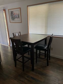 Dining room table and chairs