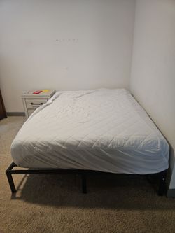 Queen Sized Mattress and Bed