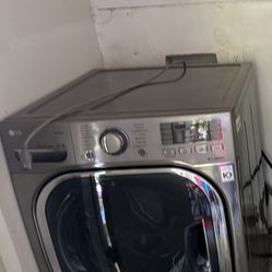  - 4.5 LG Cu. Ft. High-Efficiency Stackable Smart Front Load Washer with Steam and Built-In Intelligence - Black Steel