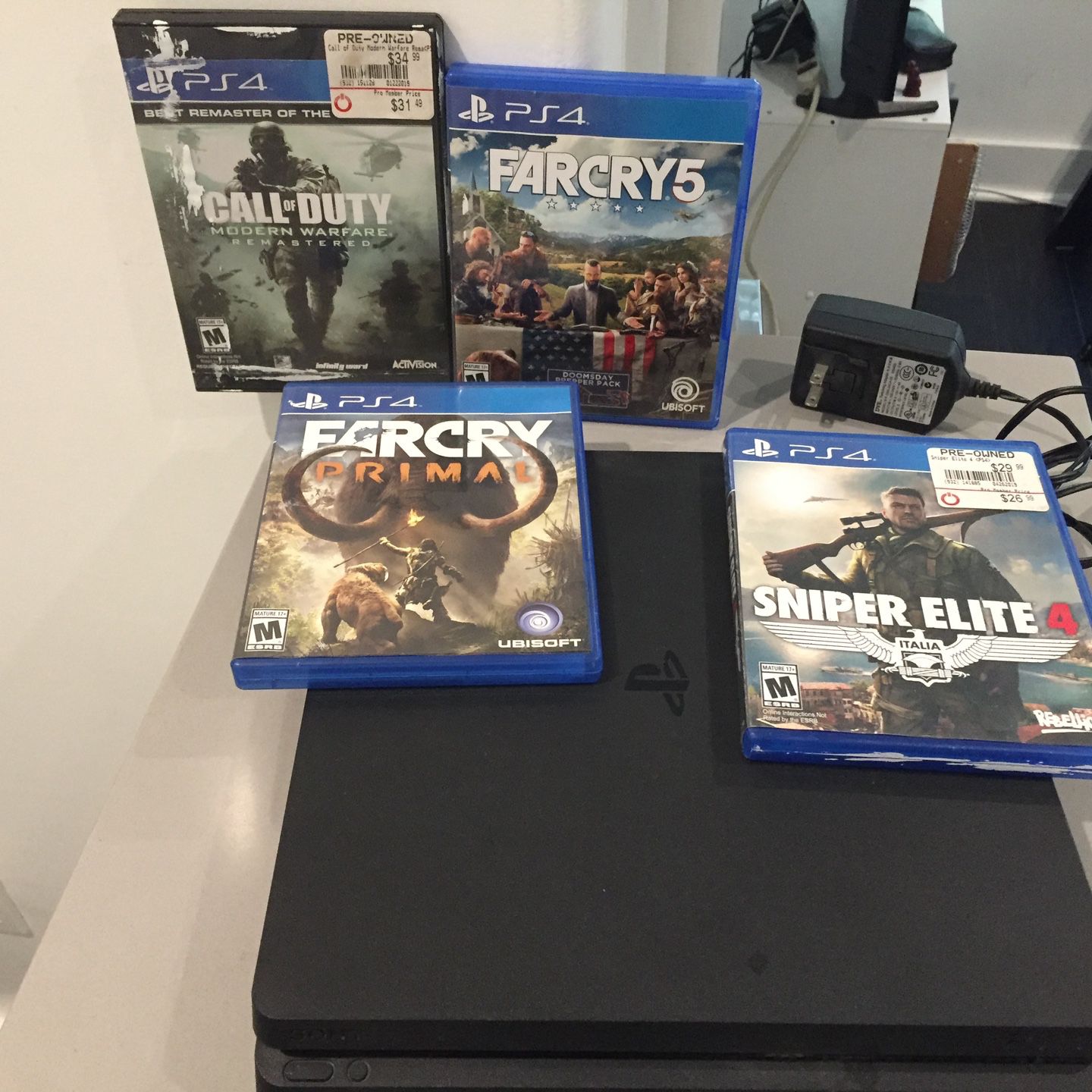 PS4 With 2 Controller And 4 Games