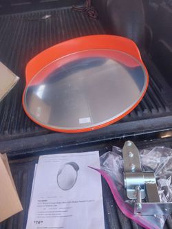 10" PARKING MIRROR NEW IT STILL HAS CONVEX PLASTIC ON MIRROR THATS WHY IT LOOKS OFF CLEAR