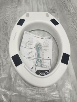 Open box never used Carex Toilet seat elevator for elongated toilets