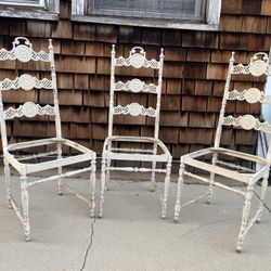 CAST IRON CHAIRS $75