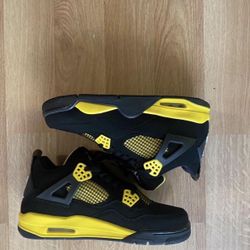Yellow Thunder Jordan 4s