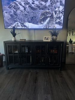 Black Wood TV Console with Glass Doors