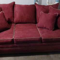 Super Comfortable, Suade/ Leather Like Material.  Practically Brand New.  Very Deep And Long Sofa. 