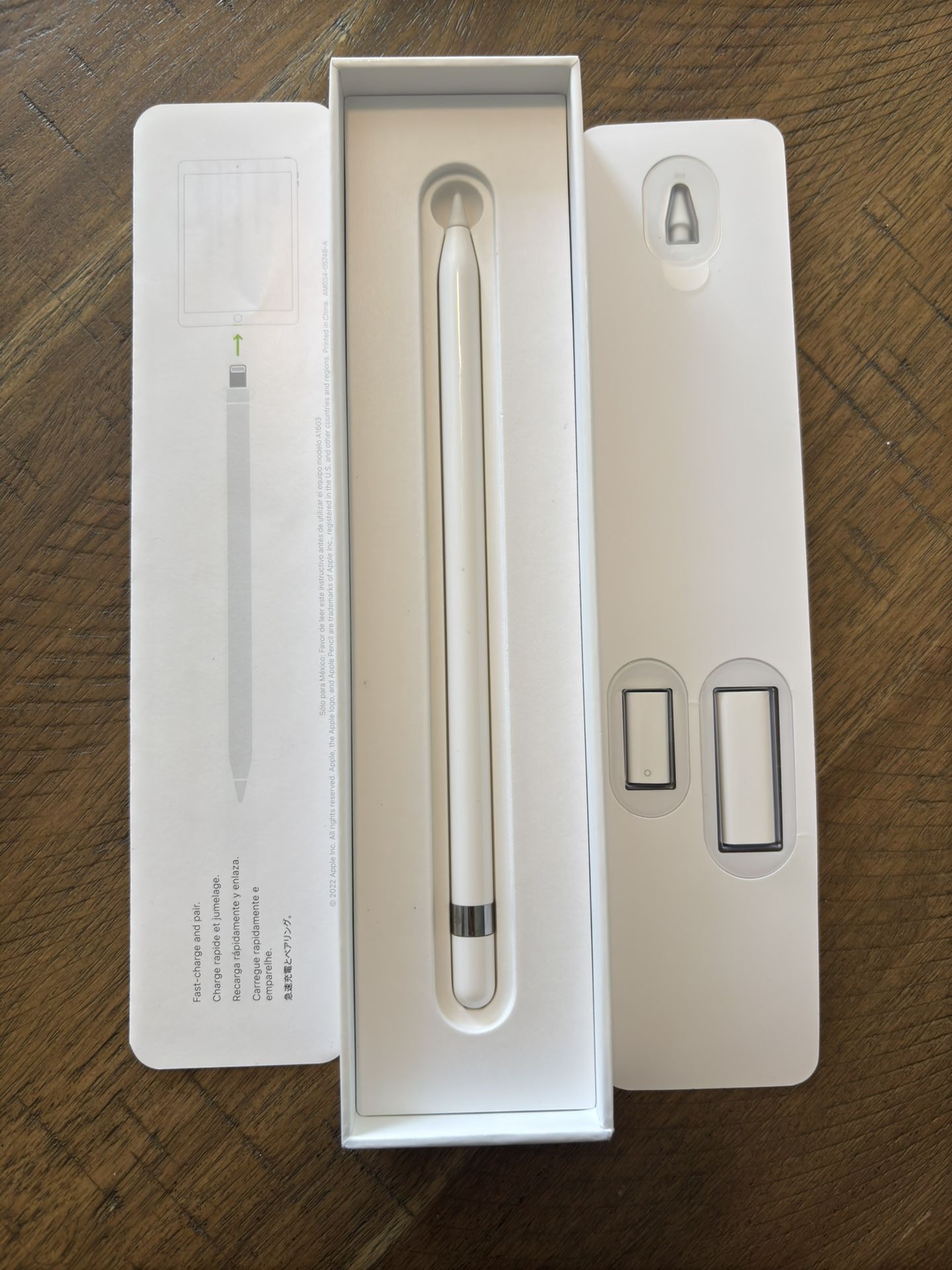 Apple Pencil (1st Generation) with USB-C adapter. Includes unused tip