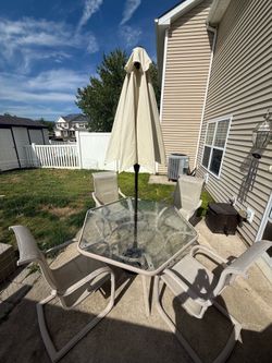 Glass Patio Table, Umbrella, and 4 Chairs