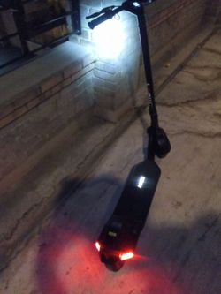 Black Electric Scooter with Front and Rear Lights