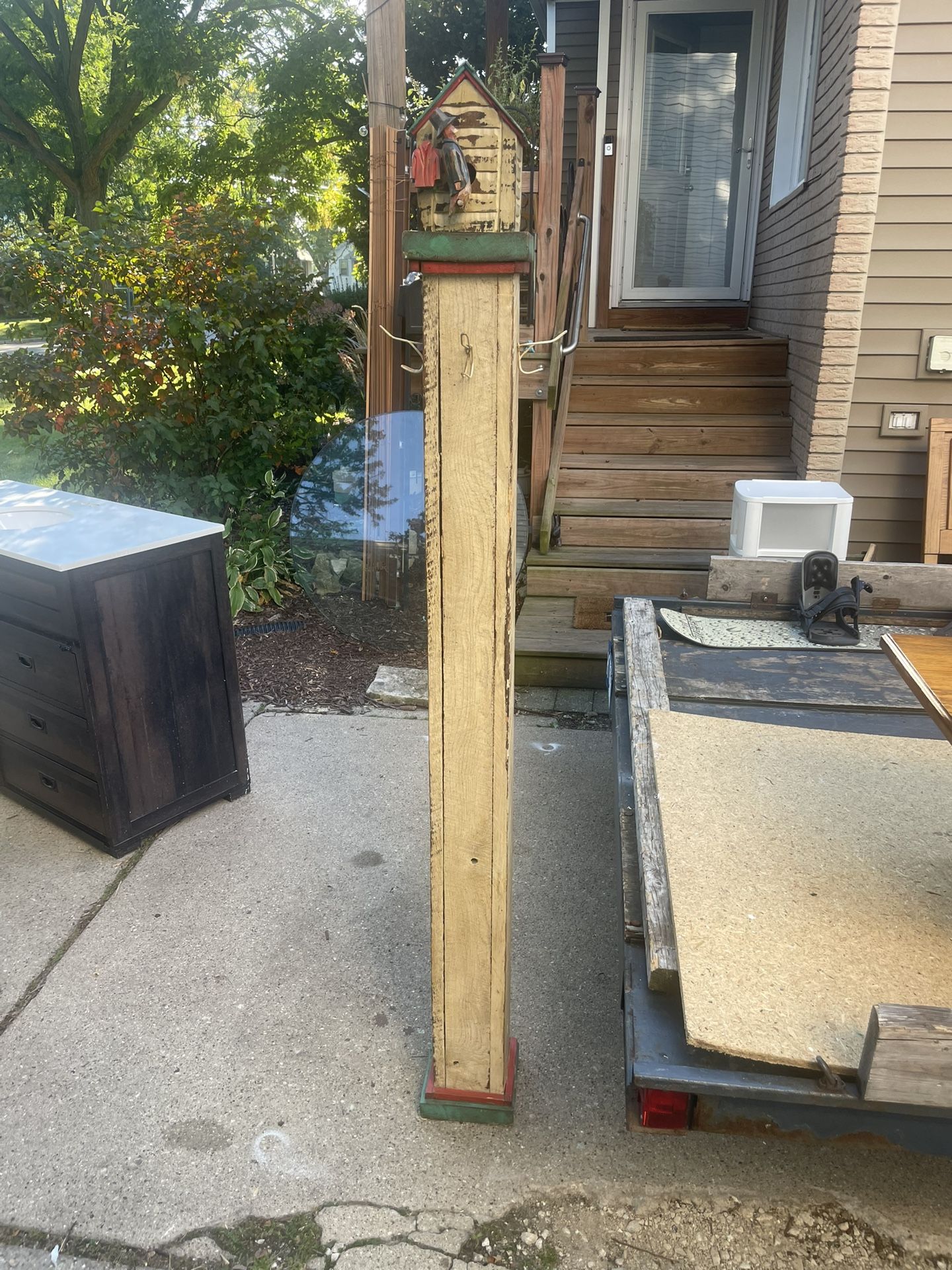 Birdhouse Decorated Wooden Coat Rack with carved bird guy, post 6 by 6 in. Poke is 6 feet high, $25