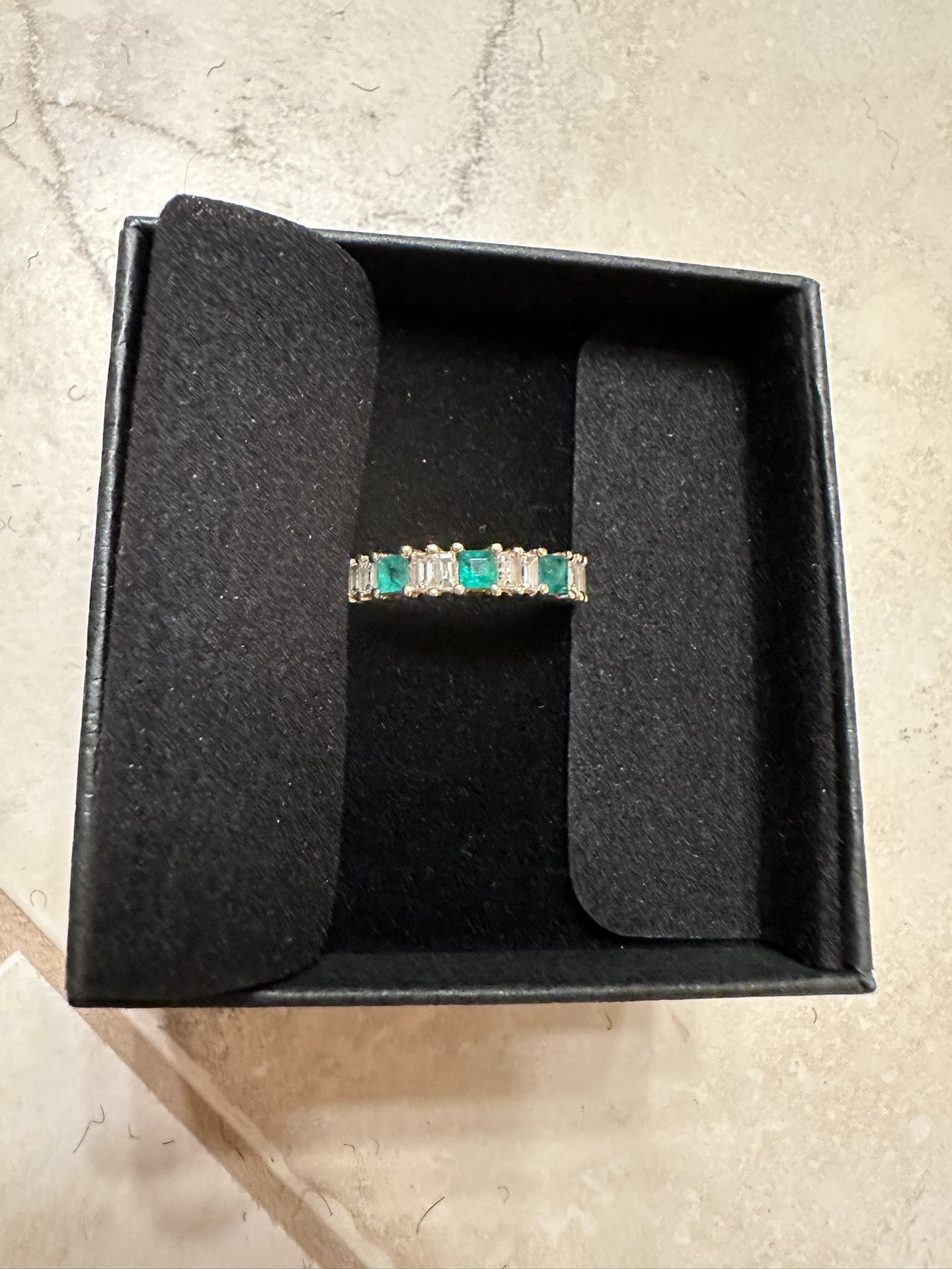 Emerald and diamond ring
