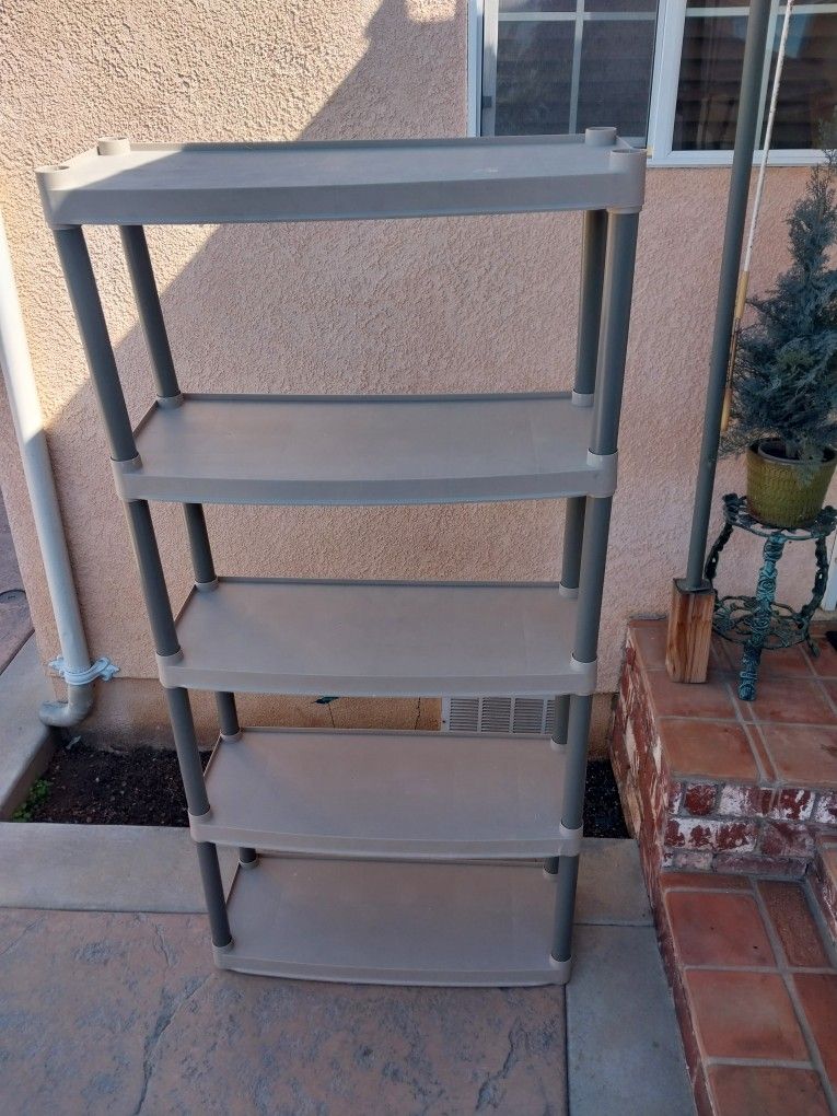 PLASTIC STORAGE RACK LIKE NEW CHECK PICTURES FOR MEASUREMENTS 