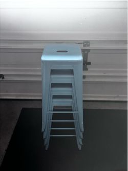 4 teal stools