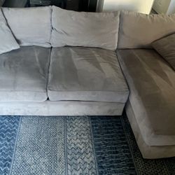 Gray couch with chaise lounge 