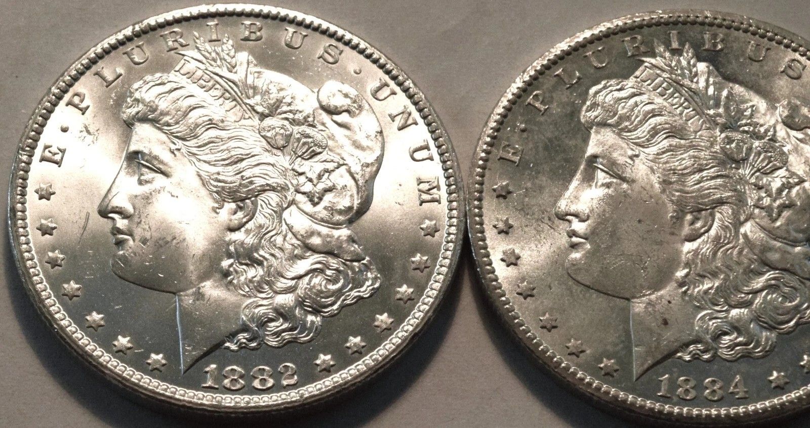 Lot (2) Uncirculated Carson City Morgan Silver Dollars 1882 CC 1884 CC $1 Coins