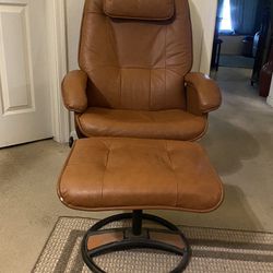 Brown Vinyl Swivel Chair With Recline And Ottoman 