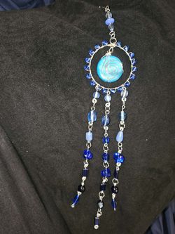 Handmade sun catchers and positionable Beaded spiders