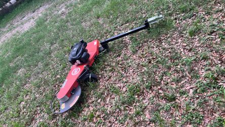 Dr Power pull behind large line trimmer.