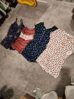 4 rompers in various styles different sizes see below