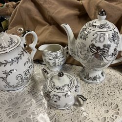 9 Pieces 25 Th Anniversary  Set With 2 Kattle And Auger Creamer.