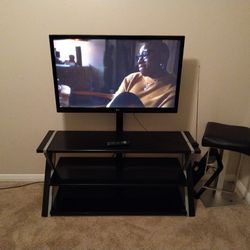 TV Stand With TV Come With Remote 
