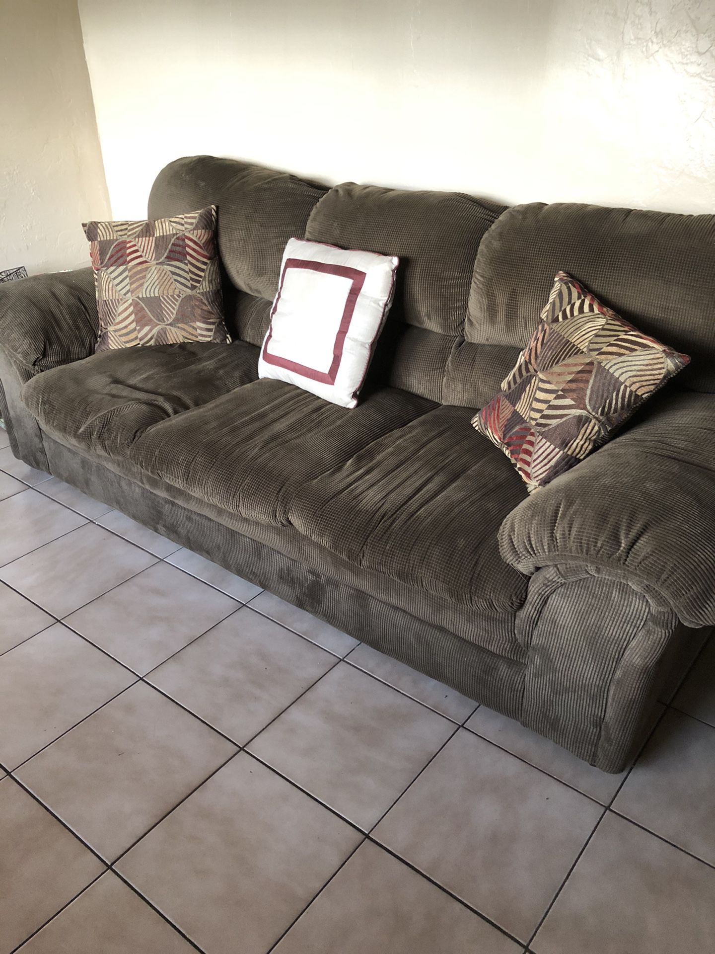 Sofa, Recliner and End Table in perfect condition color brown
