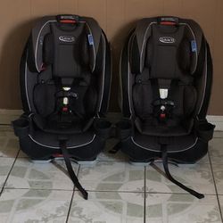 TWO LIKE NEW GRACO SLIM FIT CONVERTIBLE CAR SEATS!!!!!