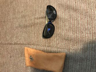Brand new pair of saints sunglasses with case