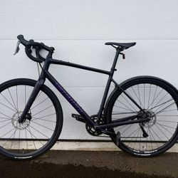 Selling my 2024 Specialized Diverge, size 58cm. Matte black with purple.  Recently replaced tubes and new tires. Recently serviced disc brakes.  New b