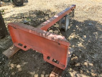 Skid steer telescoping lifting attachment