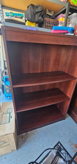 Cherry color bookshelf 43in tall