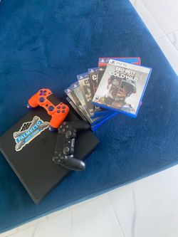 PS4 slim (with 10 games)