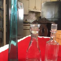 Oil and Vinegar Clear Glass Bottles and a Blue Glass Flower Vase