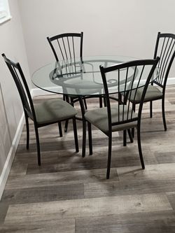 Glass table with chairs