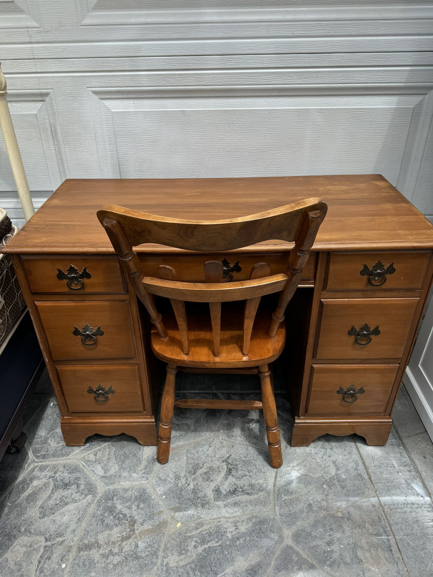 Antique solid Maple wood 7- drawer  writing desk $95, matching chair $25 . 19 deep by 41L by 29 1/2 H