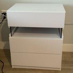 nite stand or table has plugs and light like new